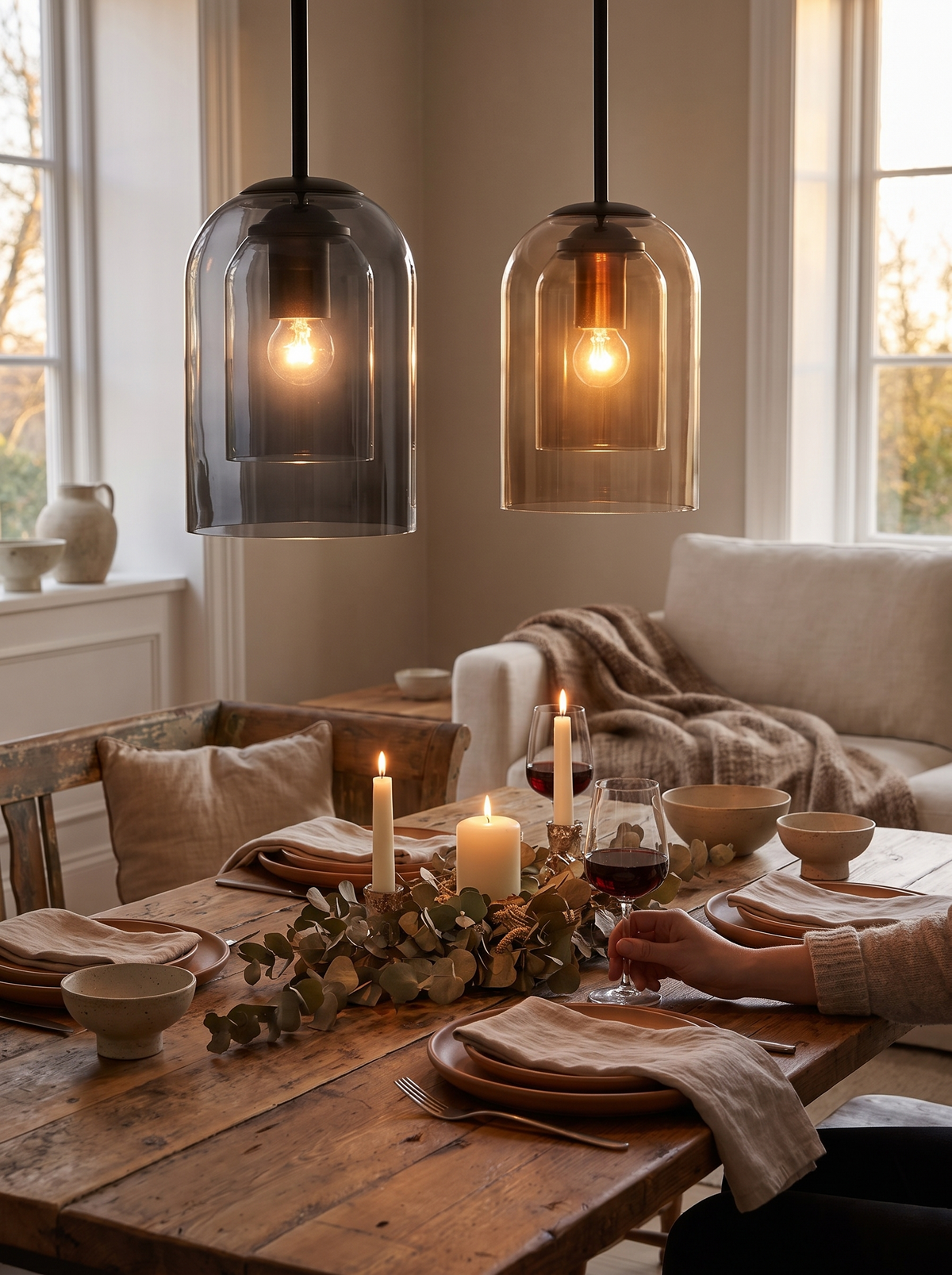 Amber brown glass pendant warming a timber table